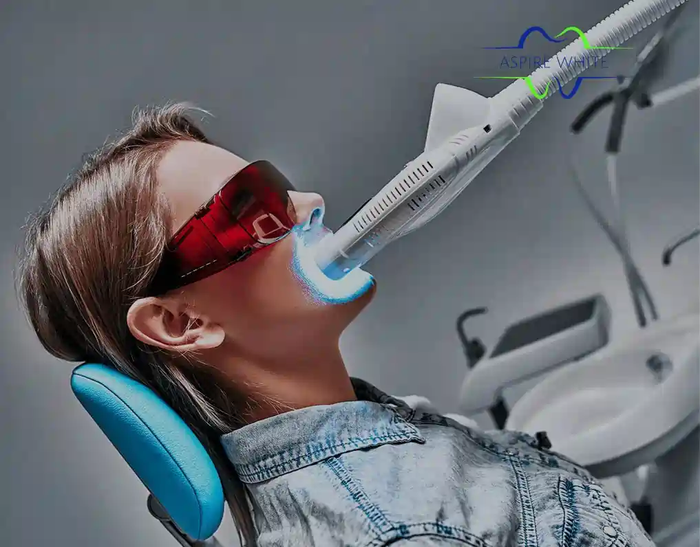 Patient relaxing in clinic chair during 1 hour laser teeth whitening session Stratford upon Avon